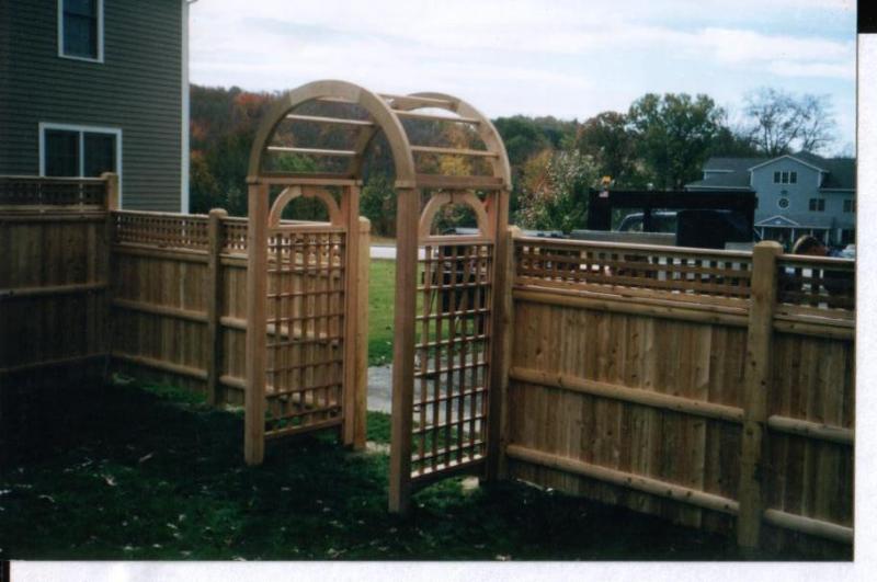 Wood Fence with Arbor